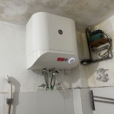 Bình nước nóng gián tiếp RHEEM XC-15W (2.500W, 15L), màu trắng